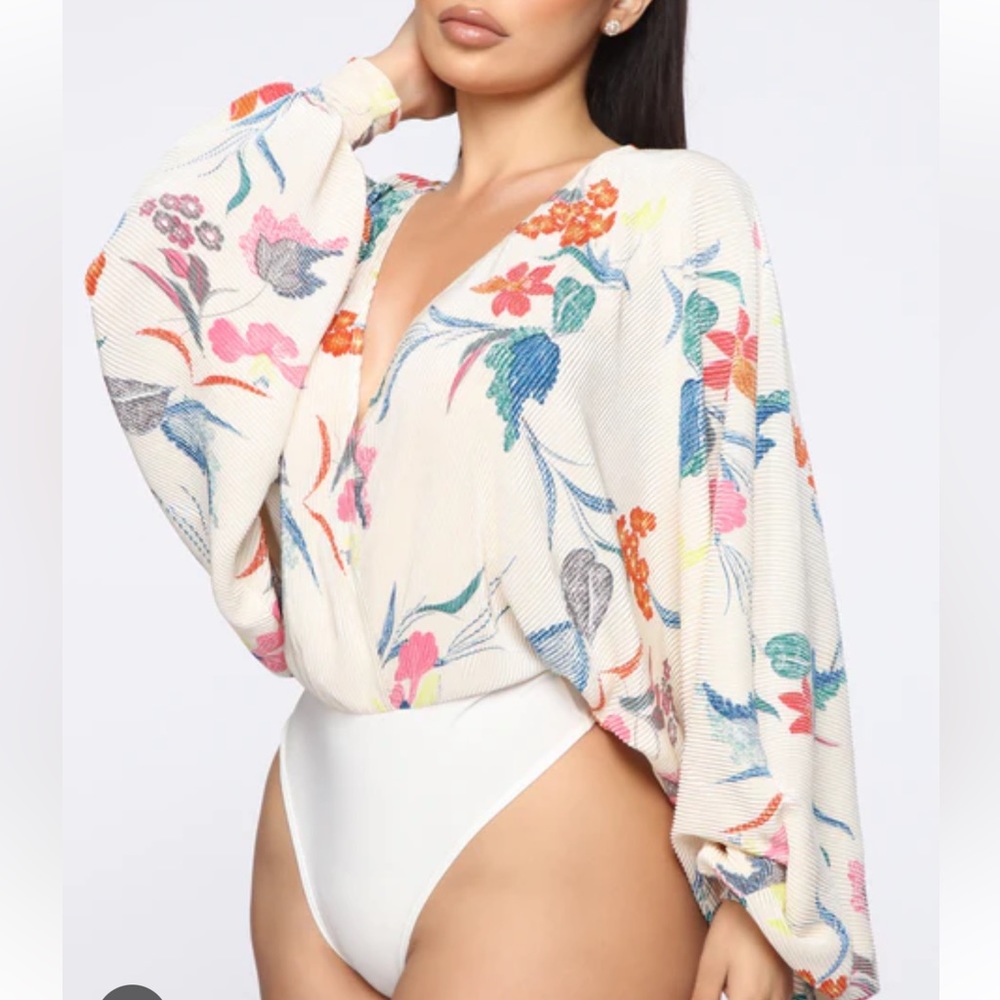 Flower print body suit. Fits beautifully!!!